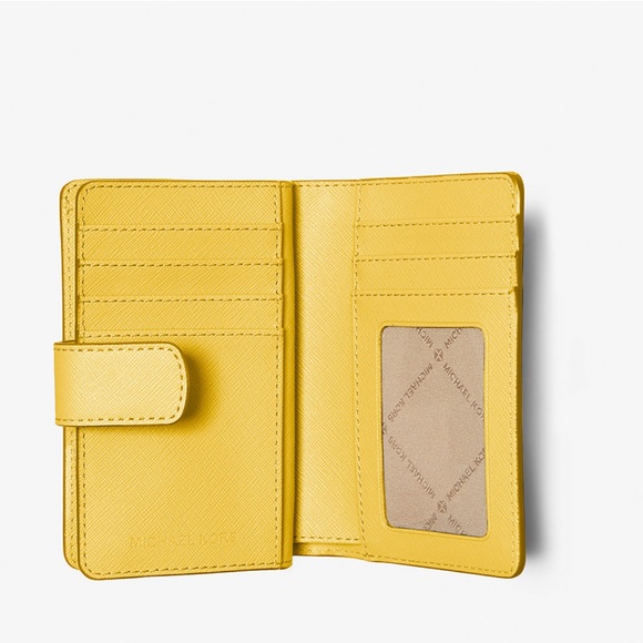 Michael Kors Medium Crossgrain Leather Wallet
COLOR GOLDEN YELLOW
NWT - Picture 7 of 16